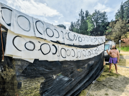 Participatory enso wall with circular brush paintings